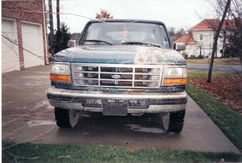 1996 Ford Bronco - Front view of a 1996 Ford Bronco, showing its grille and headlights.