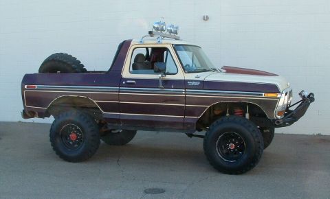1979 Ford Bronco - Modified 1979 Ford Bronco with off-road tires and auxiliary lighting.