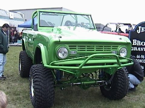1995 Ford Bronco - This heavily modified first-generation Ford Bronco features a custom roll cage and off-road bumper.