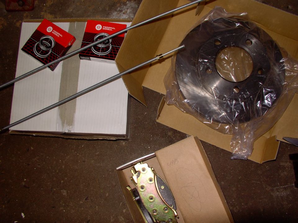 Trouble was they were practically giving away rotors at $38.00 CDN ($20 to resurface what would you have done?).  Got better lines with the fancy spring around them too.