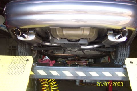 2003 Ford Taurus - Underneath view of a 2003 Ford Taurus showing its dual exhaust system.