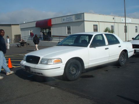 1999 Ford Crown Victoria - '00 retired Washington State Patrol Crown Victoria. Ready for the auction. All of the cars below (except for the Fury) are retired WSP cars.