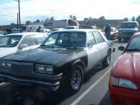 1999 Ford Crown Victoria - '89 Plymouth Fury. This car belonged to a school district I beleave.