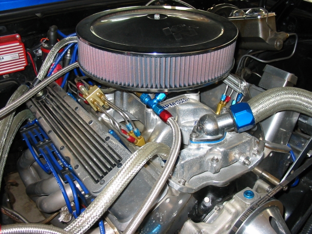 Chromed V8 engine bay with round K&N air cleaner and braided AN lines