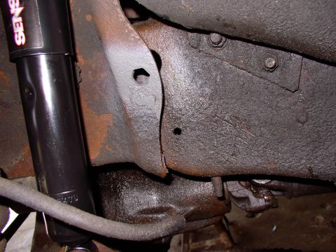 1986 Ford Bronco - Highlighted in Ford gray is the hole the brake hose is secured into. After 19 years the hoses and particularly the steel lines they go into…