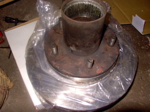 1986 Ford Bronco - I just left the plastic rotor bag on until I get it mounted so I can grease the hub without doing the rotor too.
