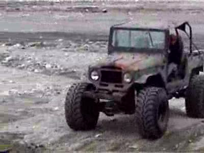 2000 Ford F-450 - John jumping the cruzer