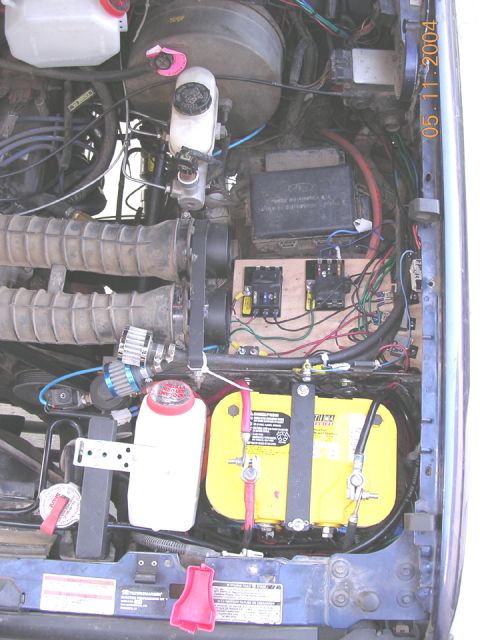 1994 Ford Bronco - auxilliary battery with new coolant reservoir and fuse panel thing