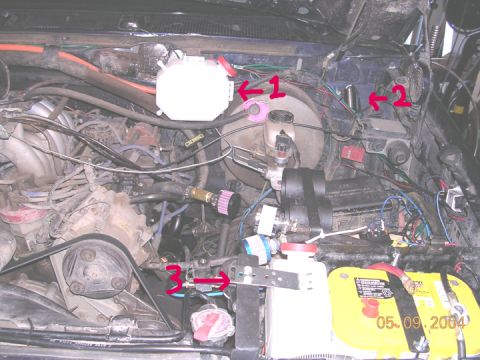 1994 Ford Bronco - washer reservoir(#1), new universal pump wired to existing pump wiring (#2) and new coolant reservoir(#3)