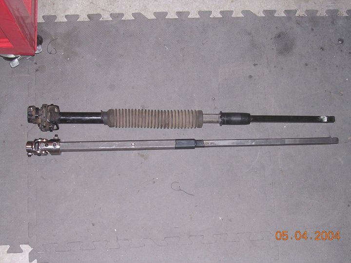 old shaft with rubber rag joint next to new shaft with Flaming river ujoint