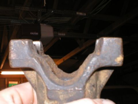 1978 Ford Bronco - Rusty driveshaft U-joint yoke, likely from an older vehicle.