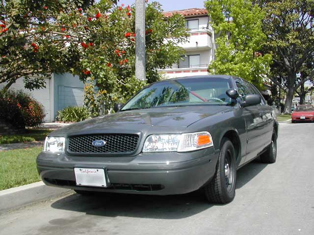 Gray 2000 Ford Crown Victoria front 3/4 view