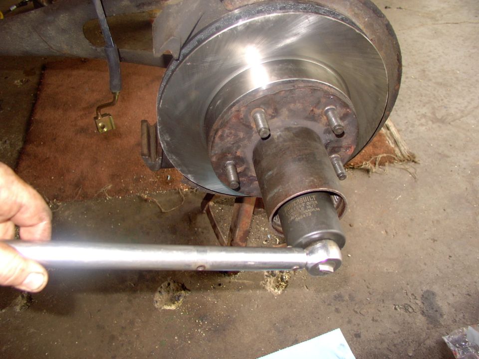 With my kind of 1986 Dana 44 manual hub bearings they wanted 70lbs to seat them, then back off a 1/4 turn and re-torque to 15-20 ft/lbs.