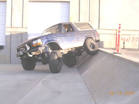 1994 Ford Bronco - I reworked the front shocks while doing the dual batts and exhaust. the front is no where near coming off the ground, but There was no more…