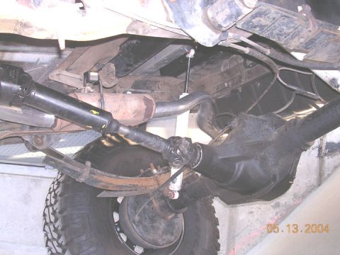 1994 Ford Bronco - went to a local shop which charged too much to bend some pipe for me. this is what they gave me. when I relocated the shocks, i screwed the…