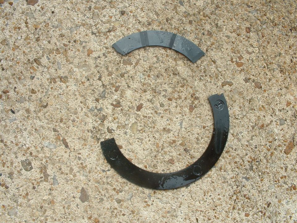 Two engine bearing shells on concrete