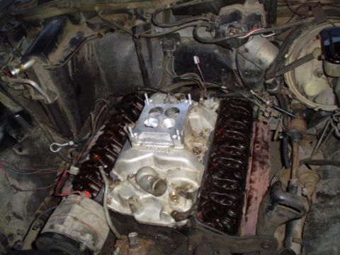 1981 Ford Bronco - stuck the gaskets to the intake minus the ends and pressed it into place. Then installed a few bolts till the contacted the intake. Put the…