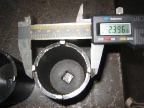 1994 Ford Bronco - Measuring a socket wrench part with digital calipers. The measurement shown is 2.396 inches.