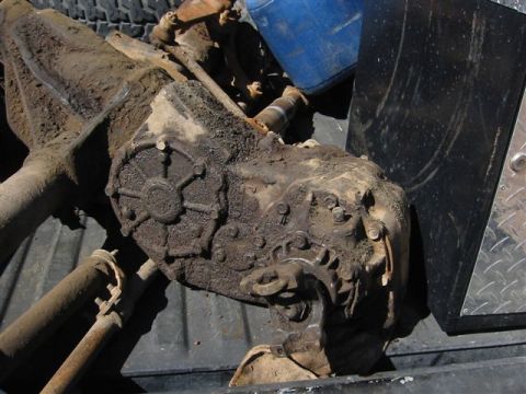1994 Ford Bronco - Transfer case part, likely for an older 4x4 vehicle, appears heavily used.