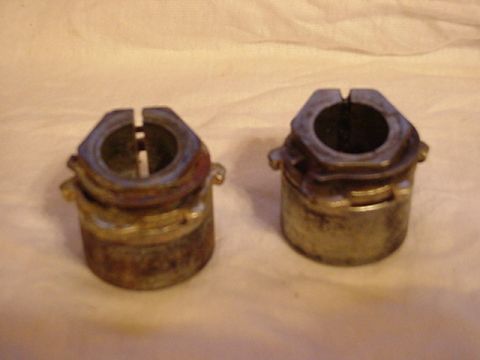 1993 Ford Bronco - Two automotive suspension bushings are shown, likely for a vehicle's sway bar.