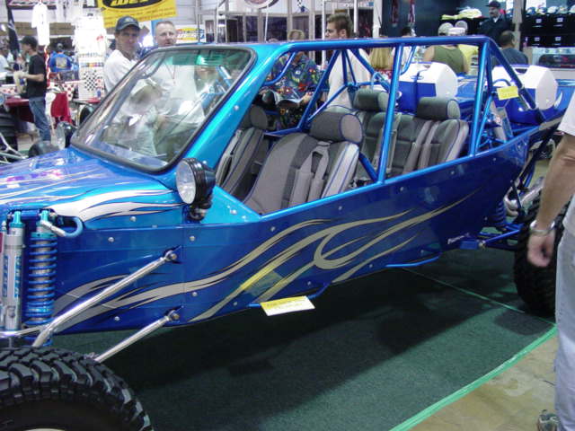 Blue dune buggy with flame decals and roll cage