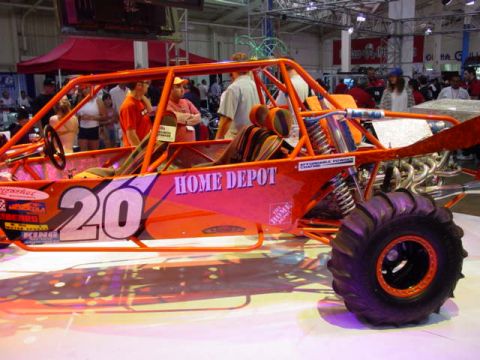 1992 Ford Bronco - This custom buggy with 'Home Depot' branding is displayed indoors, likely at a show.