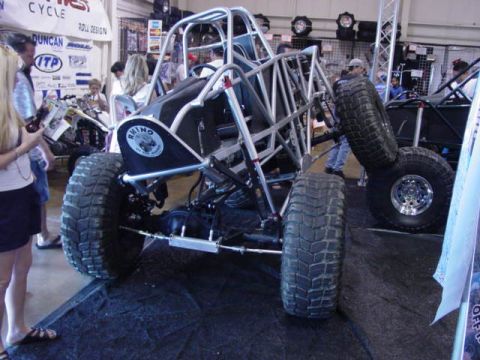 1992 Ford Bronco - Custom off-road buggy on display at an event, large, aggressive tires.