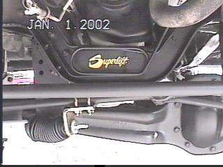 1993 Ford Bronco - Close-up of a Superlift suspension component, timestamped January 1, 2002.