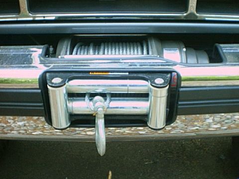 1995 Ford Bronco - Front view of a winch installed on a Ford Bronco, likely from the early to mid-1990s.