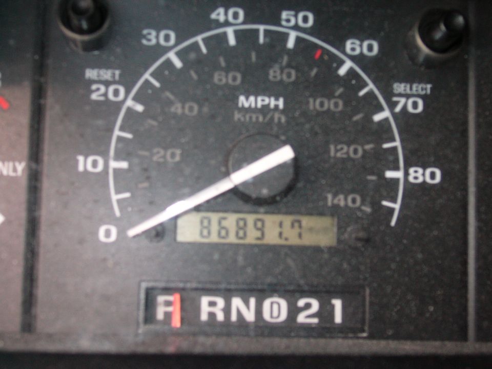 Instrument cluster speedometer reading and odometer showing 86891 miles with PRND21 gear display