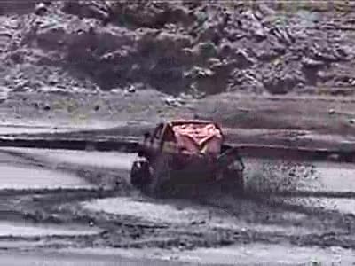 2000 Ford F-450 - carlos catching some speed in the mud