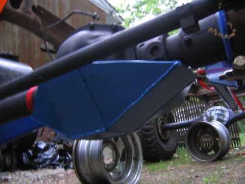 1978 Ford Bronco - Custom skid plate installed on a vehicle's rear differential assembly.