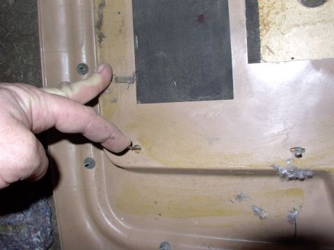 1986 Ford Bronco - There's lots of them and three kinds of clips to remove and try to save for re-installation.