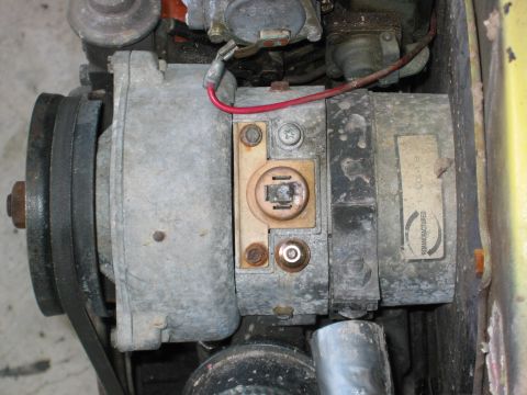 1990 Ford Bronco - This photo shows a close-up view of a vehicle's alternator, which appears to be a remanufactured part.