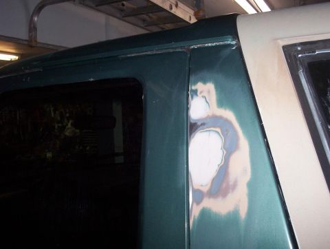 1989 Ford Bronco - dent behind drivers door