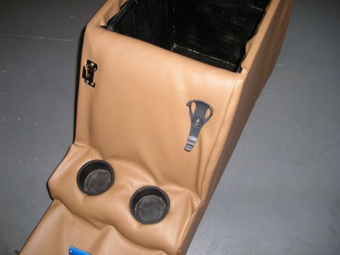 1996 Ford Bronco - This aftermarket center console features a tan vinyl finish and includes two cup holders and storage space.