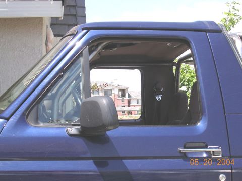 1994 Ford Bronco - The photo shows the interior of a blue SUV, with a date stamp of 05.20.2004.
