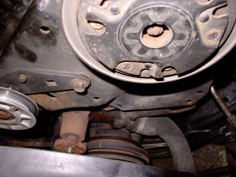 1986 Ford Bronco - There's the leaker ! Already moved the Saginaw over, pulled clutch fan and a belt or two. Gotta get rid of the AC bracketry.
