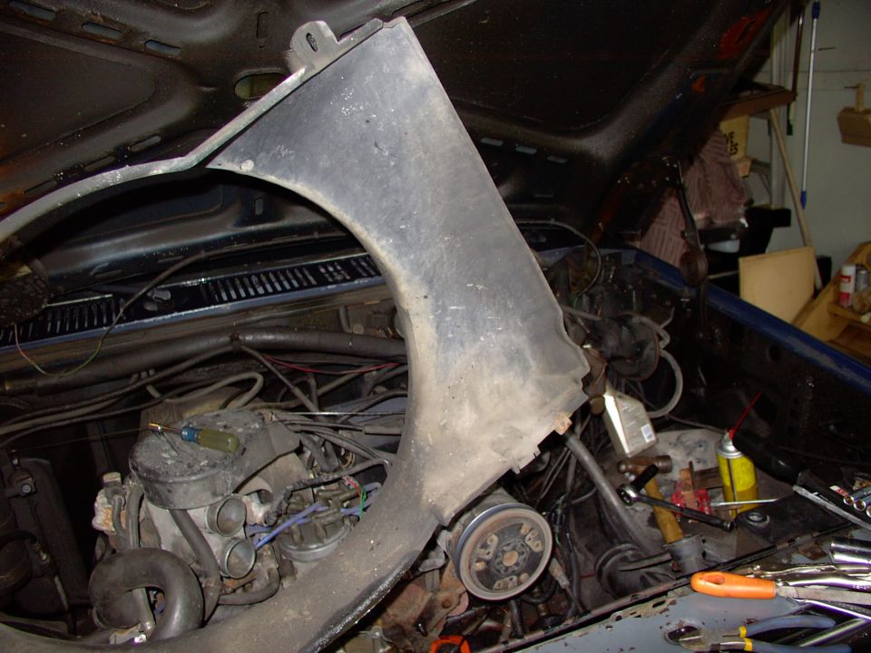 Don't need to pull this just to change the pump, but we're going in for the timing chain gear set, so catch up to here by viewing the water pump pics first.