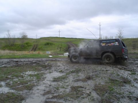 1981 Ford Bronco - hot exhaust and water makes white smoke... not to mention stuffing that front tire