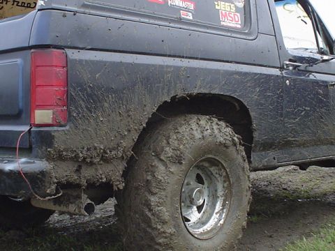 1981 Ford Bronco - This 1981 Ford Bronco is heavily covered in mud, obscuring much of its bodywork.