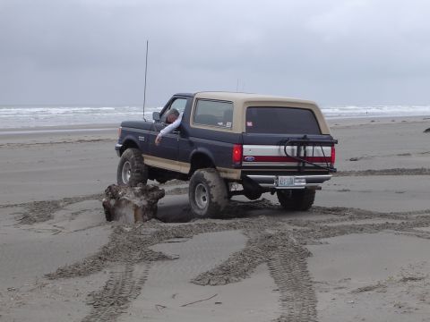 1989 Ford Bronco - Mike climbing a stump...this could lead to trouble