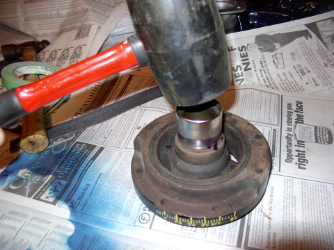 1986 Ford Bronco - Gently tapping on the repair sleeve over the loctite covered balancer snout with a rubber mallet.