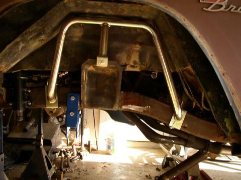 1995 Ford Bronco - Custom roll cage components are being fitted to the vehicle's frame, indicating modifications are underway.
