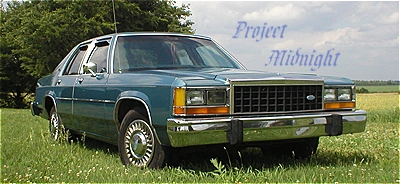 1987 Ford Crown Victoria LTD - This 1987 Ford Crown Victoria LTD is shown in a three-quarter front view, with 'Project Midnight' text superimposed on the image.
