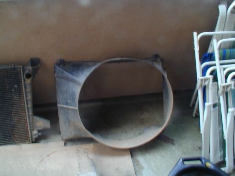 1988 Ford Bronco - Radiator fan shroud and radiator assembly shown indoors.