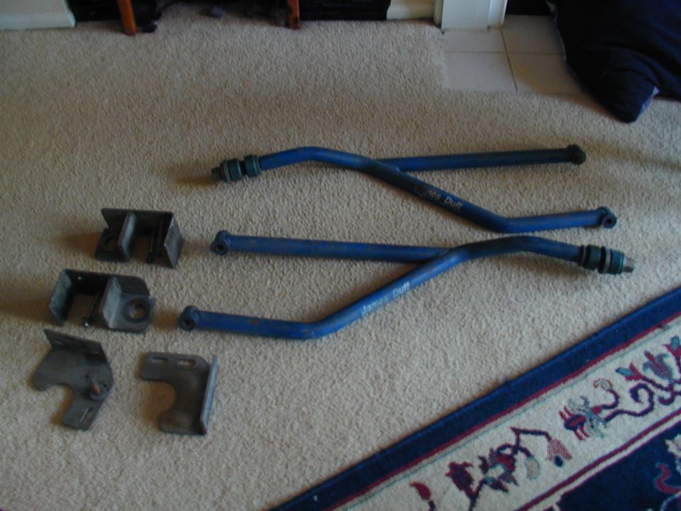 blue suspension bars and metal brackets on carpet