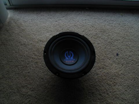 1988 Ford Bronco - A car speaker is shown on a carpeted surface.