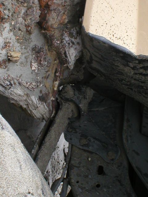 1978 Ford Bronco - Detail of corroded metal and accumulated debris, showing significant wear and tear.