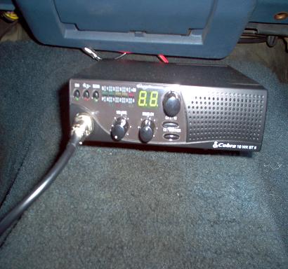 1988 Ford Bronco - CB radio unit with display and controls, installed in a vehicle's interior.
